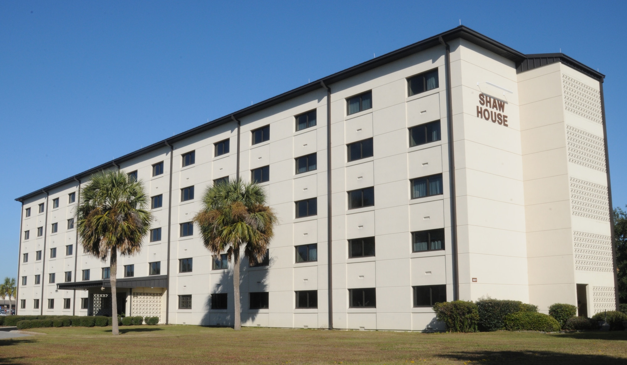 Shaw House is located along Larcher Blvd, Building 3821. The Shaw House was named after Capt. William Shaw who joined the Army Air Corps in 1940 and passed away during a mission at the Solomon Islands in Guadalcanal in 1943. Today, Shaw House is used as a lodging facility with 128 rooms for retirees, Airmen and their families to live in. (U.S. Air Force photo by 2nd Lt. David Bui)