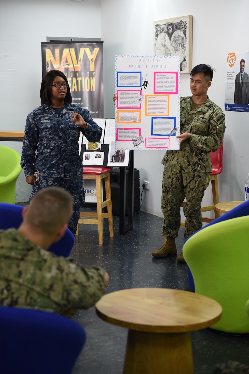 Sailors describe some Native American inventions still used widely today during a Native American Heritage Month celebration at the Singapore area coordinator’s Cafe Lah Community Center, Nov. 16, 2017. Service members highlighted the achievements and contributions of Native Americans and Alaska Natives to the United States and the American military experience. Navy photo by Marc Ayalin