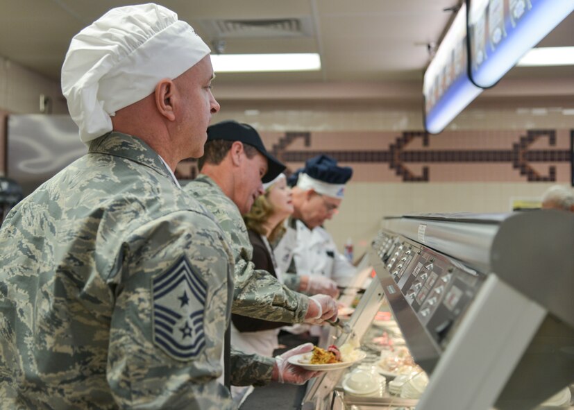 Several commanders and command chiefs took a shift serving meals at the Thunderbird Inn Dining Facility on Thanksgiving to show their appreciation to all Airmen, retirees and their families.