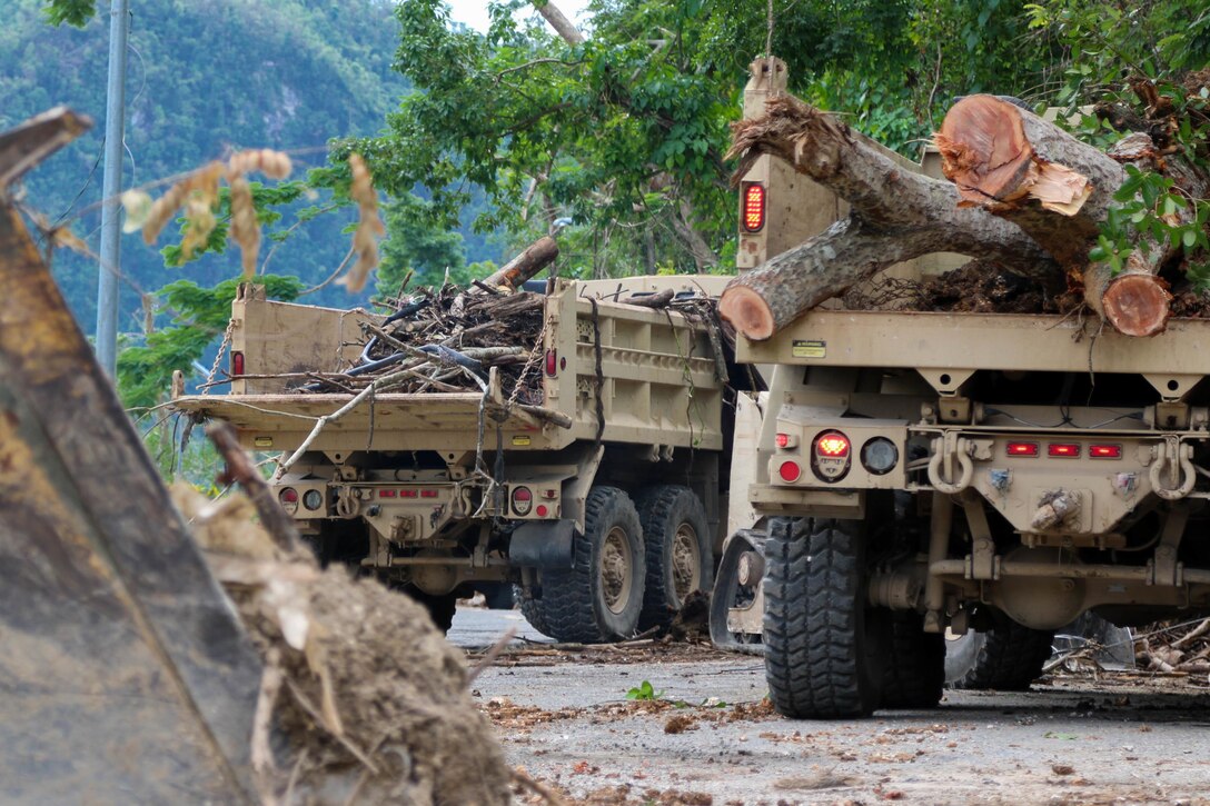 National Guard clears roads in Puerto Rico.