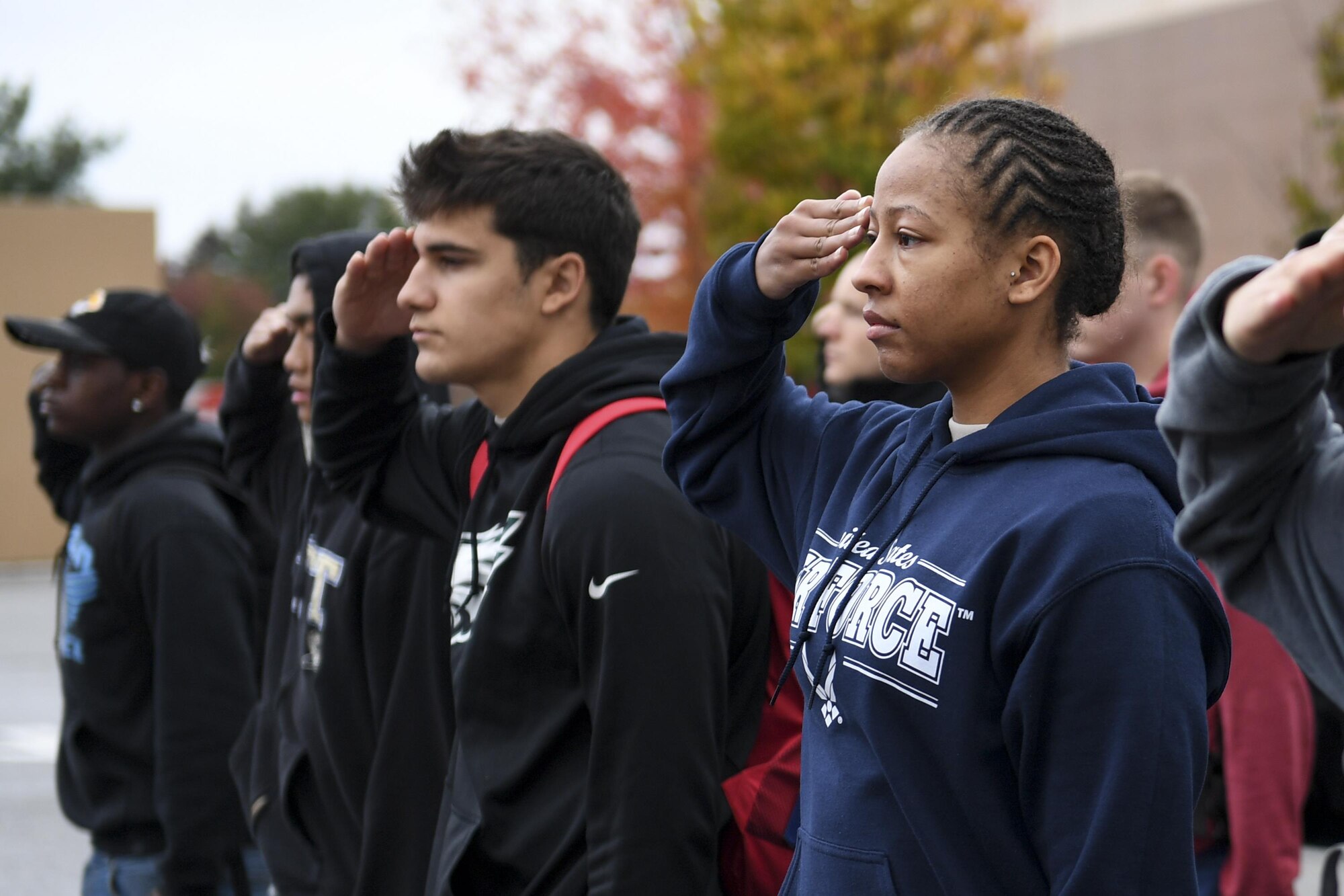 Members of the 911th Airlift Wing's Development and Training Flight practice their salutes at the Pittsburgh International Airport Air Reserve Station, November 5, 2017. During their time with the Development and Training Flight, trainees learn to salute, facing movements and how to march, as well as other skills that will prepare them for their career in the Air Force Reserve. (U.S. Air Force photo by Senior Airman Beth Kobily)