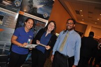 IMAGE: A representative from Naval Surface Warfare Center Dahlgren Division speaks with potential employees during the 2017 Winter Job Fair at the Fredericksburg Expo and Conference Center, Nov. 28.