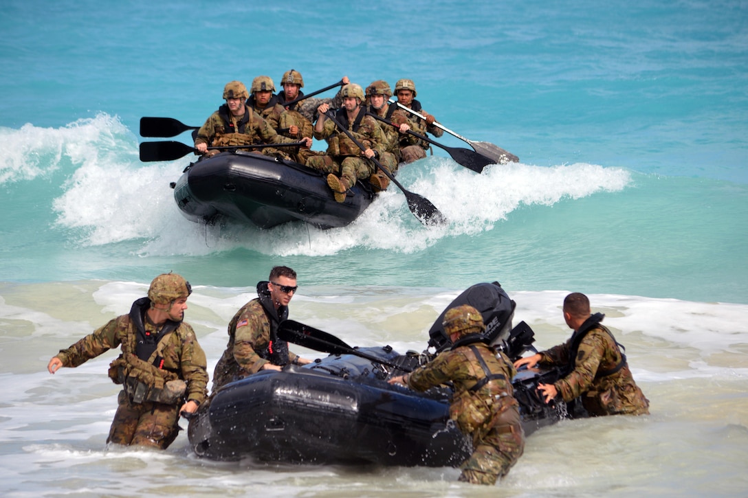 The soldiers make a successful beach landing.