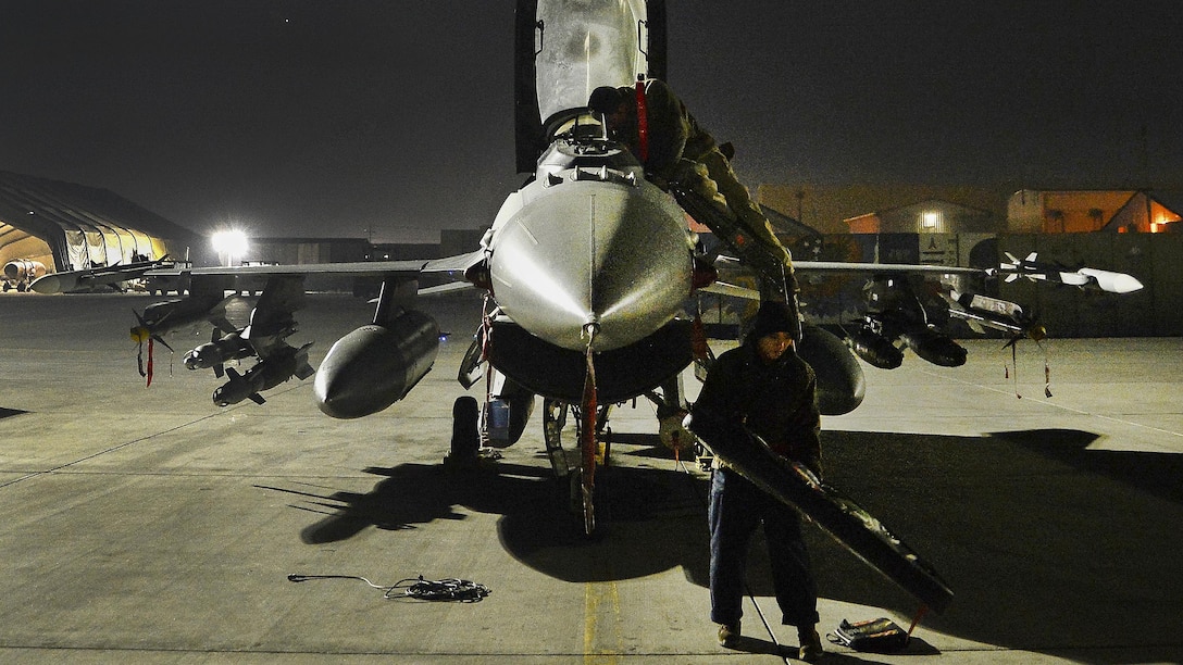 Airmen prepare a Falcon for takeoff.