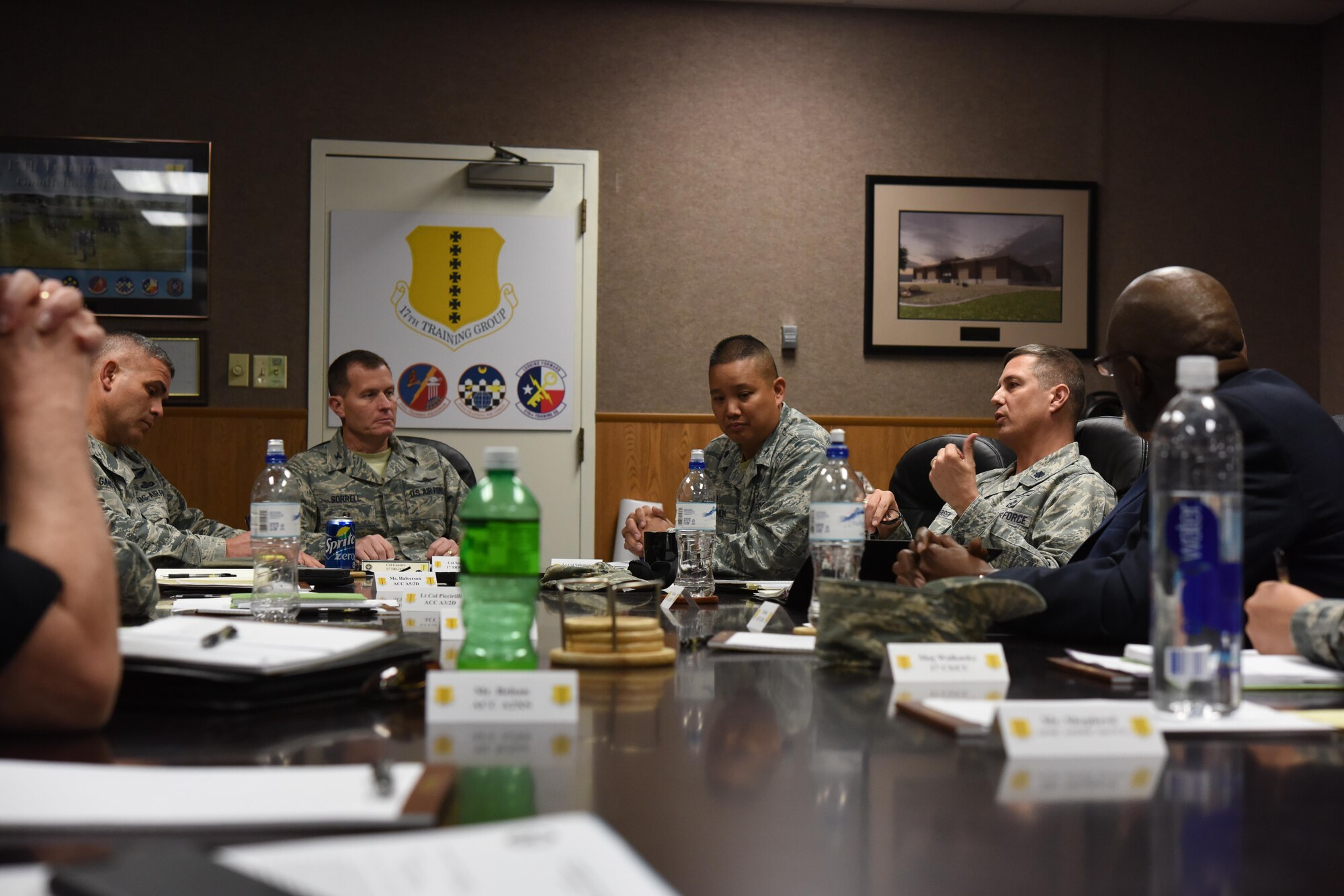 U.S. Air Force Lt. Col. Scott Jensen, Cyberspace Capabilities division chief, speaks during a meeting in the Brandenburg Hall on Goodfellow Air Force Base, Texas, Nov. 29, 2017. Jensen visited on behalf of Air Education Training Command to discuss how to increase the bases network speeds. (U.S. Air Force photo by Airman 1st Class Zachary Chapman/Released)