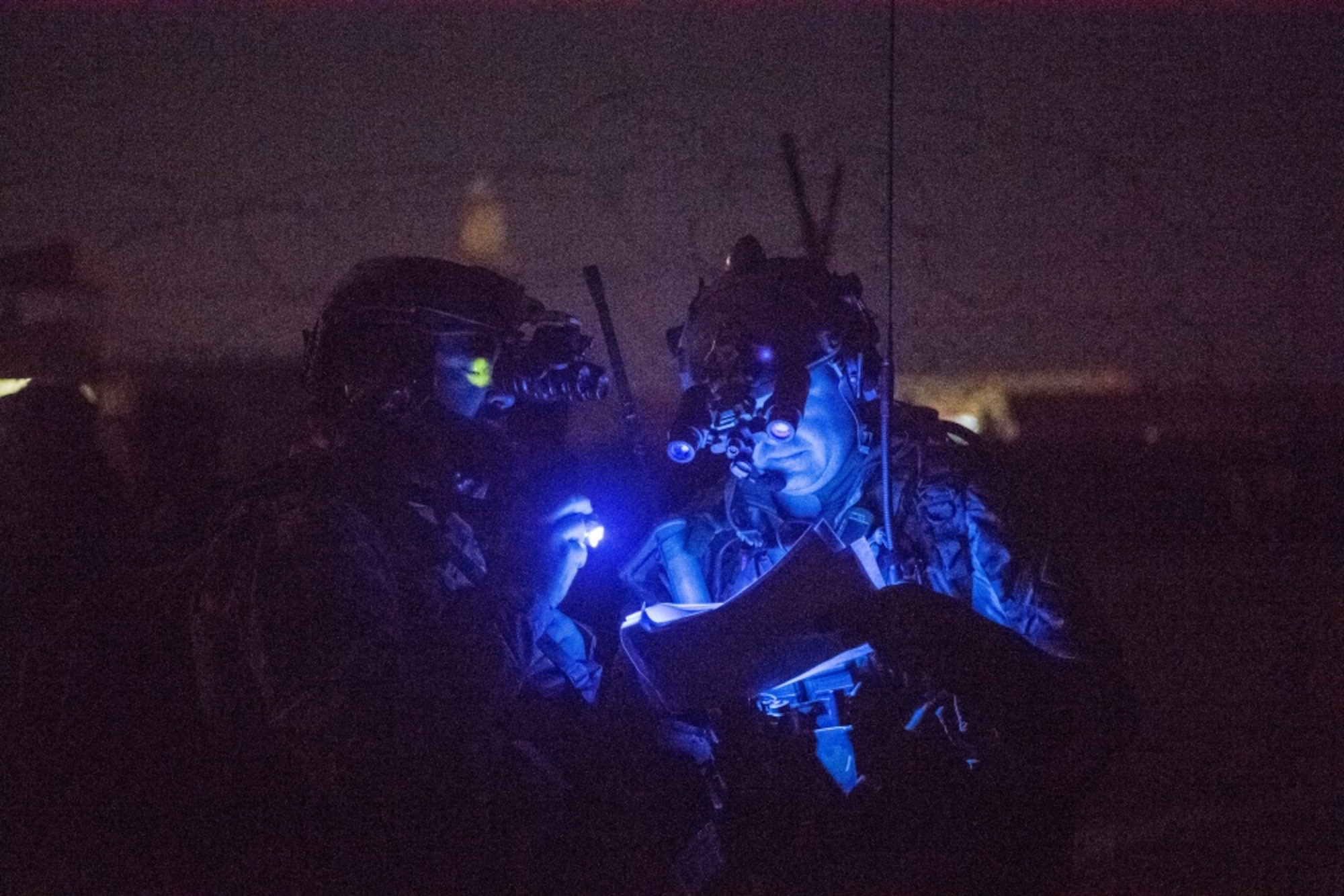 U.S. Airmen with the Air Force Special Operations Command discuss results of an airfield survey during operations in Faryab province, Afghanistan, Nov. 29, 2017. The Special Tactics Airmen ensure access to traditional airfields and landing strips to increase the operational reach of coalition and Afghan aircraft for reconnaissance, troop delivery and strategic air support operations. (U.S. Air Force photo by Staff Sgt. Doug Ellis)