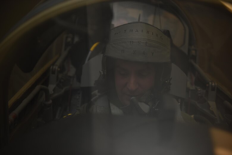 US Air Force Tech. Sgt. Joshua Cantrell, a dedicated crew chief assigned to the 131st aircraft maintenance squadron practices ejection procedures in a simulator aircraft Nov. 21, 2017 at Whiteman Air Force Base, Missouri. Flyers must demonstrate their knowledge of ejection procedures to a training instructor before flying in an aircraft.