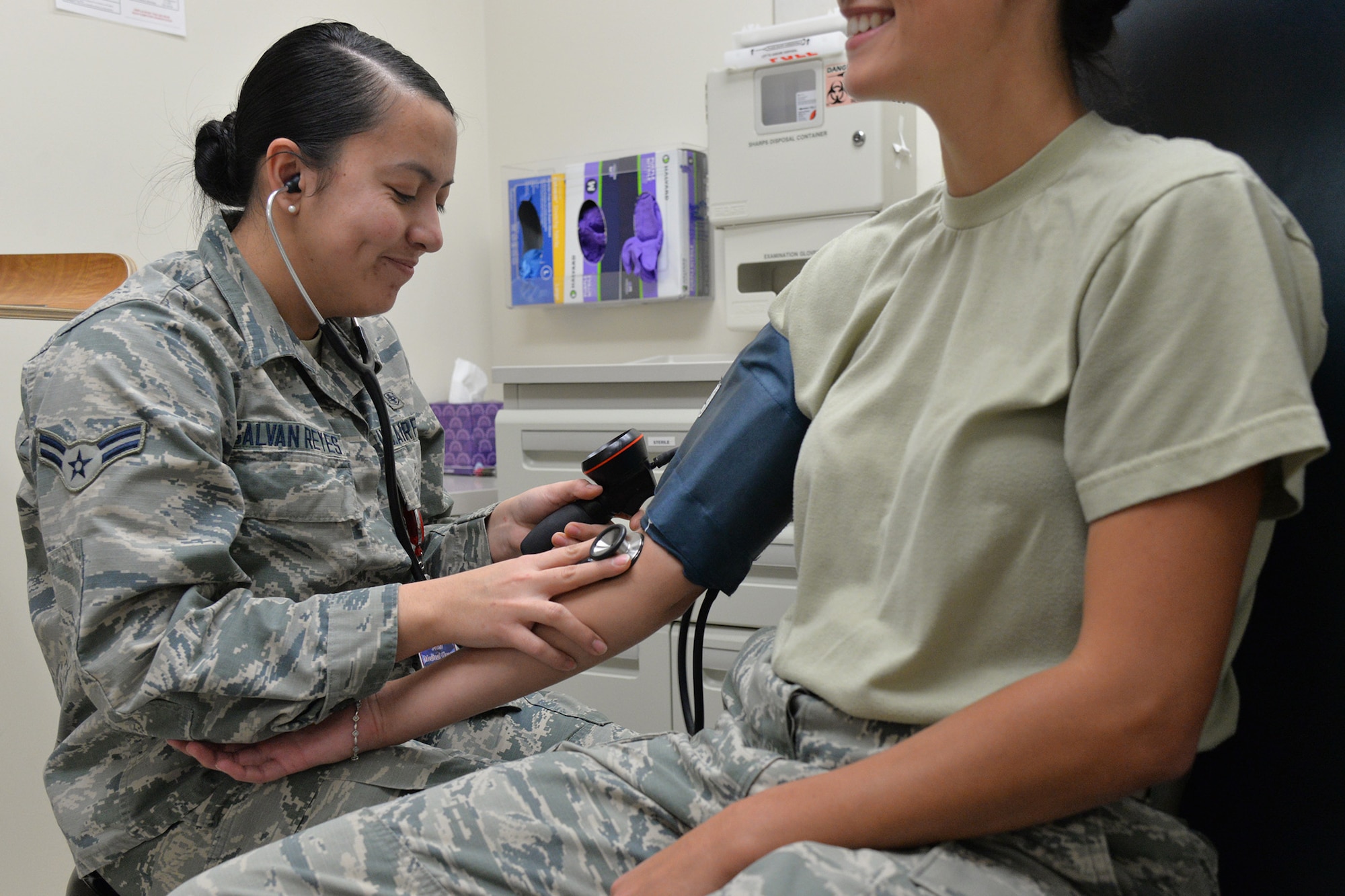 Airman 1st Class Lidya Galvan Reyes, 341st Medical Operations Squadron medical technician, checks the blood pressure of an Airman Nov. 27, 2017, at Malmstrom Air Force Base, Mont.