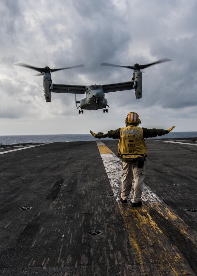 An MV-22B Osprey of Marine Medium Tiltrotor Squadron (VMM) 265 lands on the flight deck of the Navy’s forward-deployed aircraft carrier, USS Ronald Reagan (CVN 76). Ronald Reagan, the flagship of Carrier Strike Group 5, provides a combat-ready force that protects and defends the collective maritime interests of its allies and partners in the Indo-Asia-Pacific region.