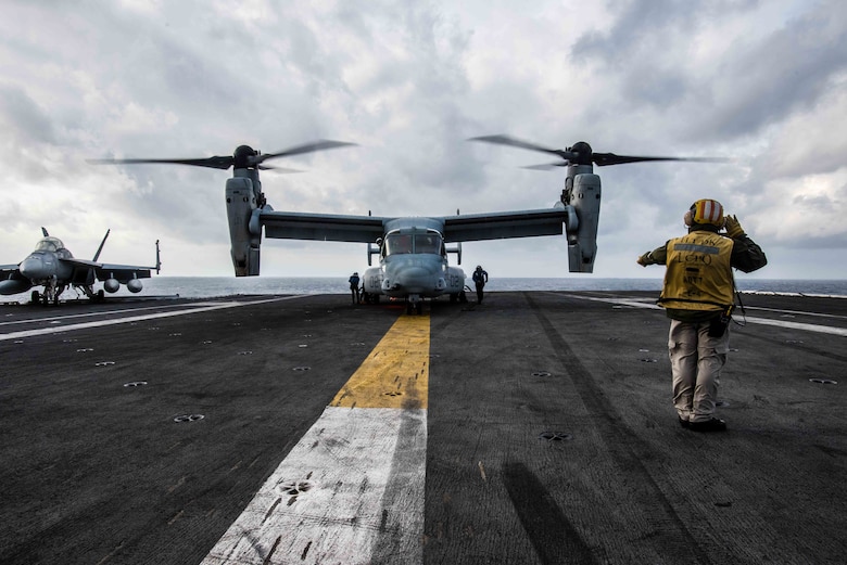 An MV-22B Osprey of Marine Medium Tiltrotor Squadron (VMM) 265 lands on the flight deck of the Navy’s forward-deployed aircraft carrier, USS Ronald Reagan (CVN 76). Ronald Reagan, the flagship of Carrier Strike Group 5, provides a combat-ready force that protects and defends the collective maritime interests of its allies and partners in the Indo-Asia-Pacific region.