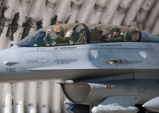 U.S. Air Force Gen. Robin Rand, Air Force Global Strike Command commander, sits in the cockpit of an F-16 Fighting Falcon with Capt. William Baker, 80th Fighter Squadron F-16 instructor pilot, before take off at Kunsan Air Base, Republic of Korea, Sept. 28, 2017. Rand is an F-16 pilot with more than 470 combat hours and a former member of the Wolf Pack as Wolf 42. (U.S. Air Force photo by Staff Sgt. Victoria H. Taylor)