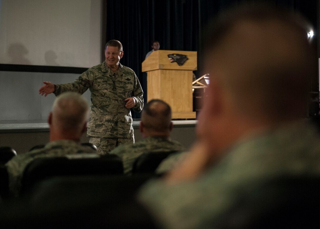 U.S. Air Force Gen. Robin Rand, Air Force Global Strike Command commander, speaks to Airmen during an all call at Kunsan Air Base, Republic of Korea, Sept. 27, 2017. Rand, a former 8th Fighter Wing commander affectionately known as Wolf 42, recounted the heritage of the Wolf Pack and the U.S. Air Force with a charge to Airmen to not only embrace heritage, but also continue to make a difference and write history. (U.S. Air Force photo by Staff Sgt. Victoria H. Taylor)