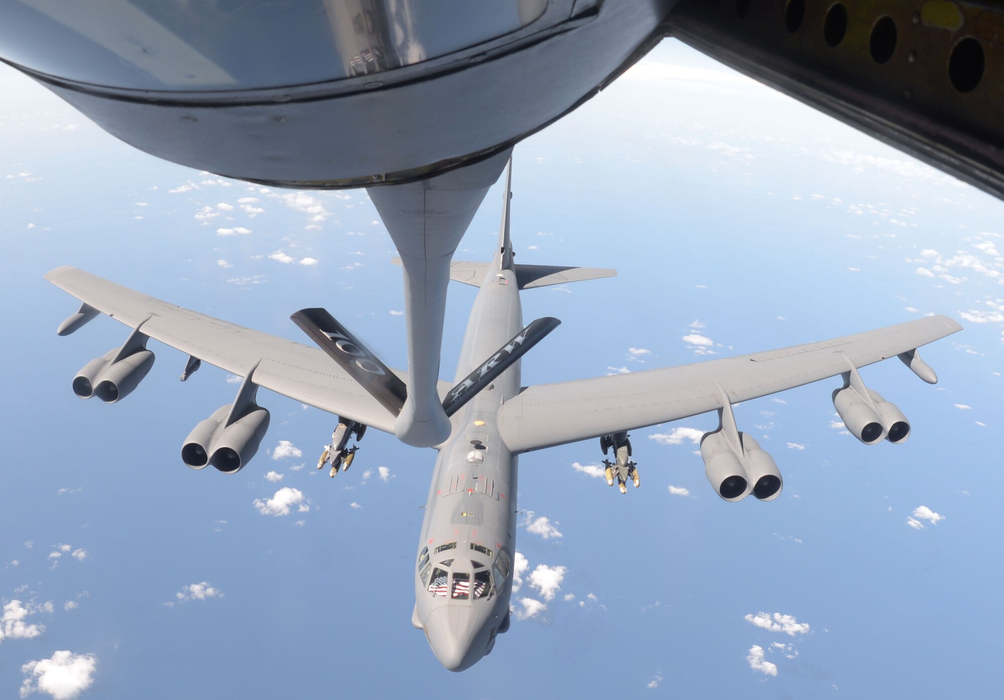 A U.S. Air Force B-52 Stratofortress from Barksdale Air Force Base, La, moves away from a KC-135 Stratotanker from RAF Mildenhall, England, after refueling Sept. 27, 2017, over the Mediterranean Sea. Part of the B-52’s training during its deployment includes releasing inert ordnance while flying over controlled airspace areas of the Netherlands and the United Kingdom.  (U.S. Air Force photo by Airman 1st Class Benjamin Cooper)