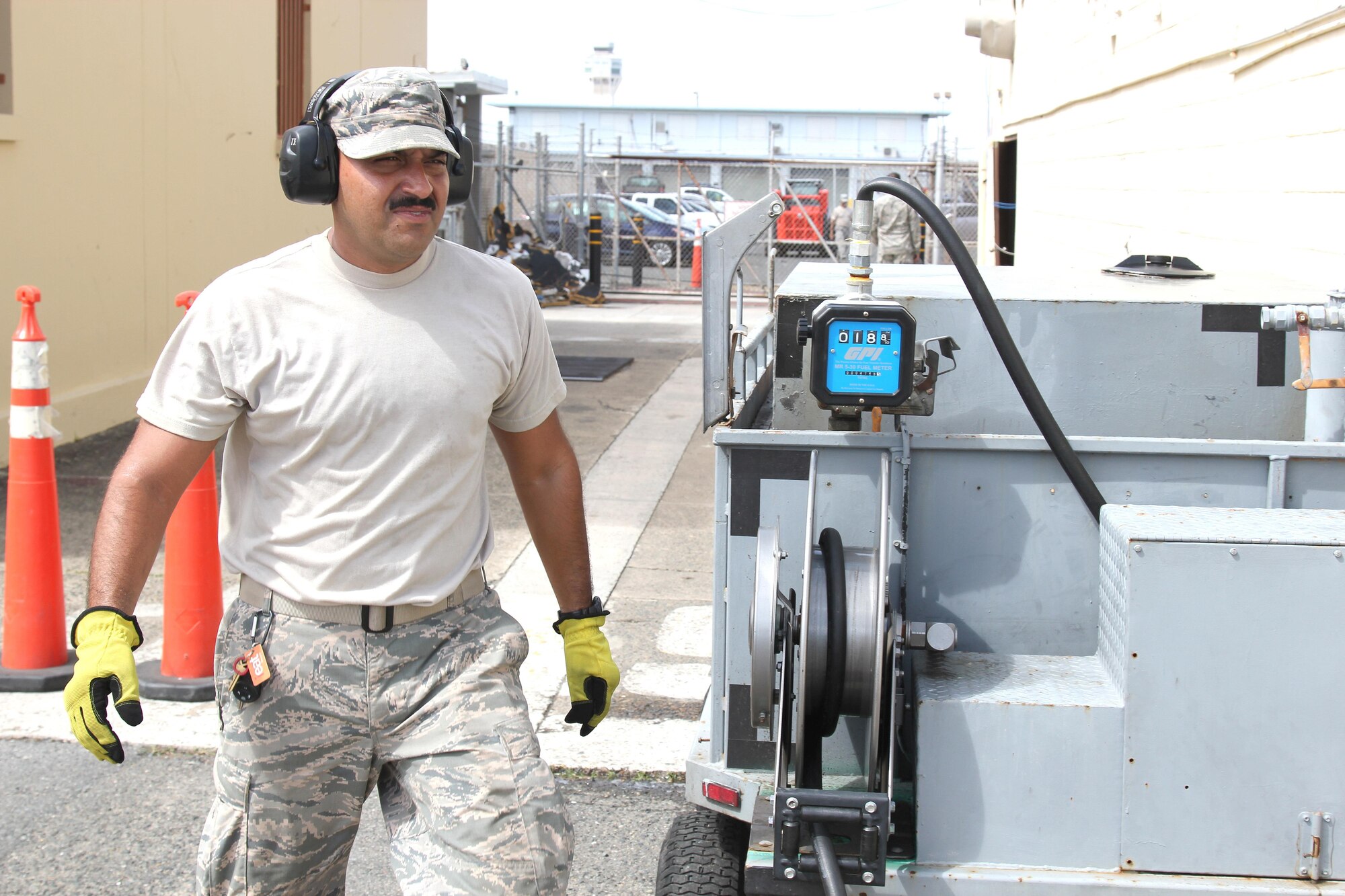 Airman 1st Class Pedro Pedraza and Staff Sgt. Carlos Arroyo travel to a generator location at Muniz Air National Guard Base, Oct. 1, 2017. The two Airmen are members of the Puerto Rico Air National Guard and are working to keep the generators running at the air base. The Puerto Rico Air National Guard is working with many federal and local agencies in response to the damage caused to Puerto Rico by Hurricane Maria, which hit the island territory on Sept. 20, 2017. (U.S. Air National Guard photo by Tech. Sgt. Dan Heaton)