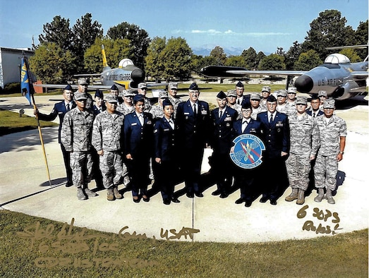Current and legacy members of the 6th Space Operations Squadron came together for a photo during Chief Master Sgt. Paul Rayman’s retirement ceremony at the Peterson Air Force Base Air and Space Museum on Saturday, Sep. 9, 2017.
