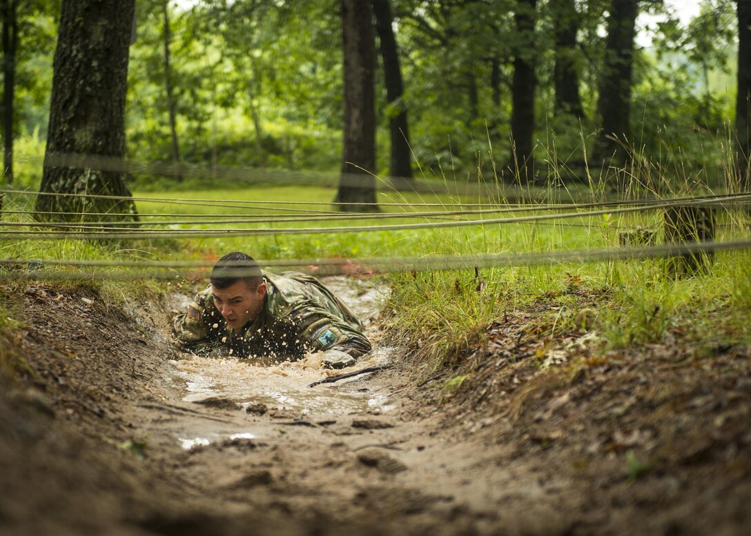 Spc. Wacey Connor of the Arkansas National Guard completes the confidence course of the 2017 Army National Guard Best Warrior Competition July 18, 2017, at Camp Ripley Training Center, Minnesota.
