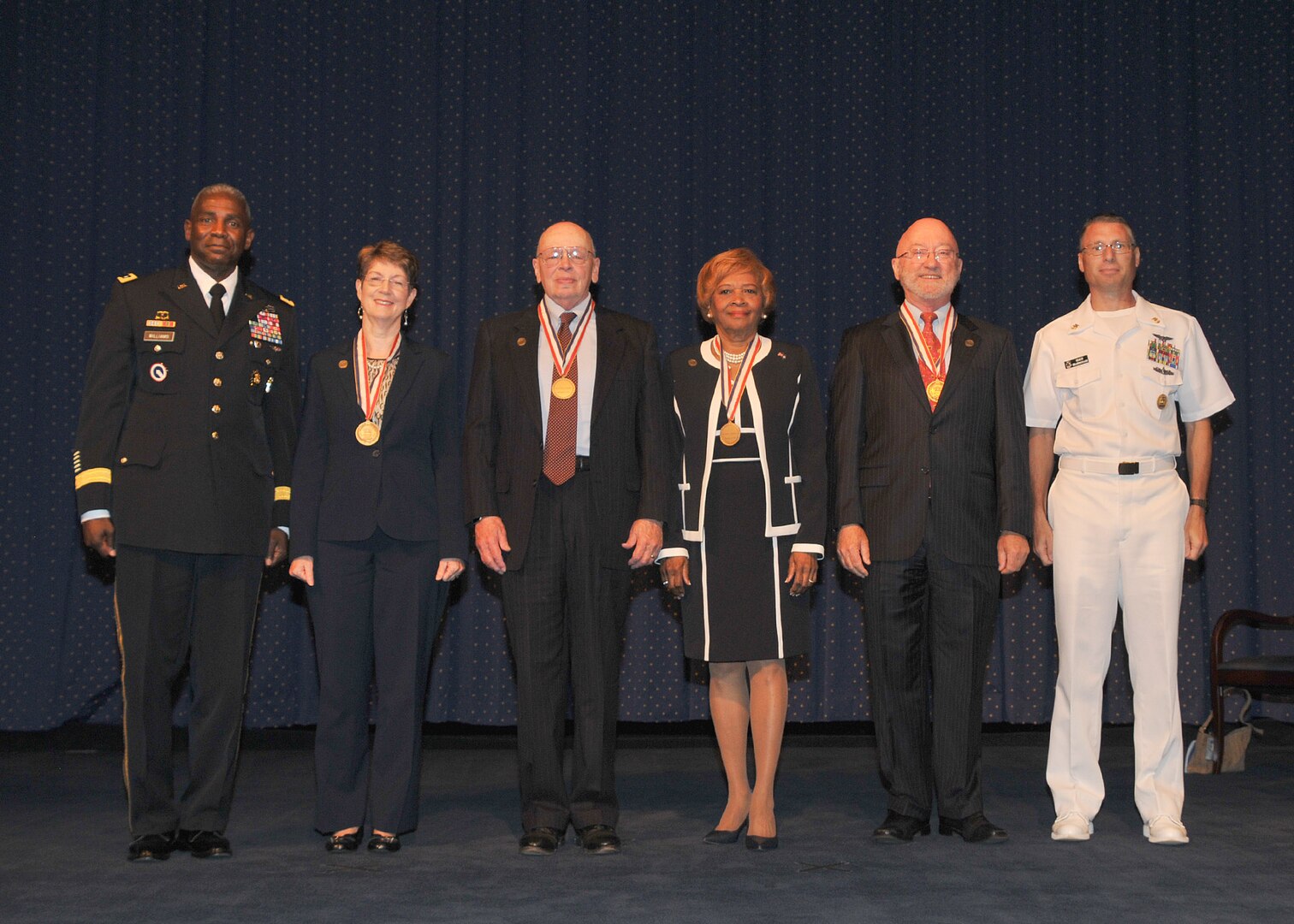 Honorees posing, facing camera