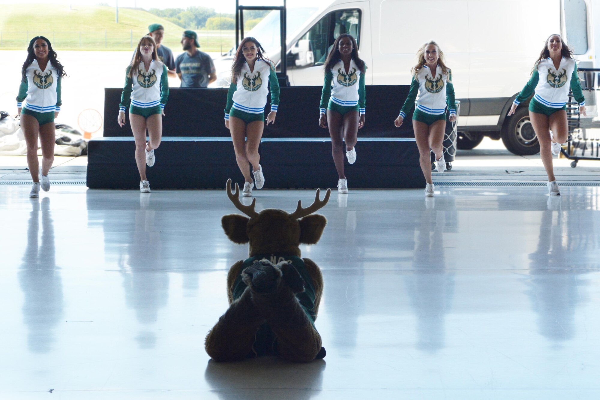 Airmen of the 115th Fighter Wing and their families were able to take a break together, at the end of the regularly scheduled drill day, Sept. 9 at Truax Field, Madison, Wisconsin to enjoy a visit from Milwaukee Bucks' Rashad Vaughn and the Rim Rockers and Hoop Troop, along with the Milwaukee Bucks Dancers and Bango, the Bucks mascot. (U.S. Air National Guard photo by Staff Sgt. Kyle Russell, 115th Fighter Wing Public Affairs)