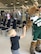 Airmen of the 115th Fighter Wing and their families were able to take a break together, at the end of the regularly scheduled drill day, Sept. 9 at Truax Field, Madison, Wisconsin to enjoy a visit from Milwaukee Bucks' Rashad Vaughn and the Rim Rockers and Hoop Troop, along with the Milwaukee Bucks Dancers and Bango, the Bucks mascot. (Photo Courtesy of 115th FW member).