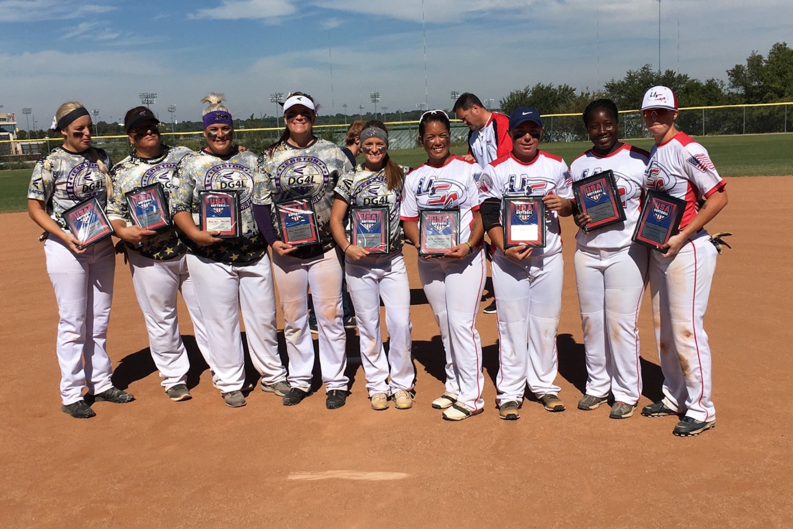 Four members of the U.S. Armed Forces Women's Softball Team earned First Team All-American Honors during the 2017 USA Softball National Championship in Oklahoma City, Okla.  From right to left, the four U.S. team members are:  Airman 1st Class Kennedy Houser of  JB San Antonio, TX; Tech Sgt. Schameka White of Pope AFB, N.C.; Petty Officer 3rd Class Jordan Brown (USS Abraham Lincoln); and Army Staff Sgt Erika Cintron, USAG Hawaii.