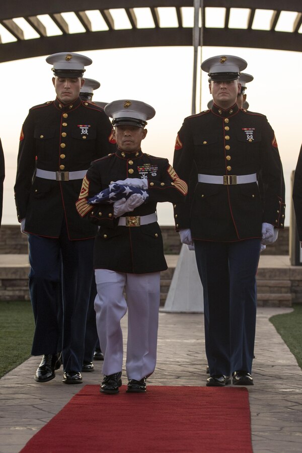 U. S. Marines with Headquarters and Support Battalion, Marine Corps Base Camp Pendleton, retire the colors during the Commanding General’s 75th Annual Evening Colors Ceremony at the Pacific Views Center on Camp Pendleton, Calif., Sept. 29, 2017. Evening colors commemorates the anniversary of the dedication of the base, this year’s ceremony also honors the 75th anniversary of Camp Pendleton. (U. S. Marine Corps photo by Lance Cpl. Betzabeth Y. Galvan)