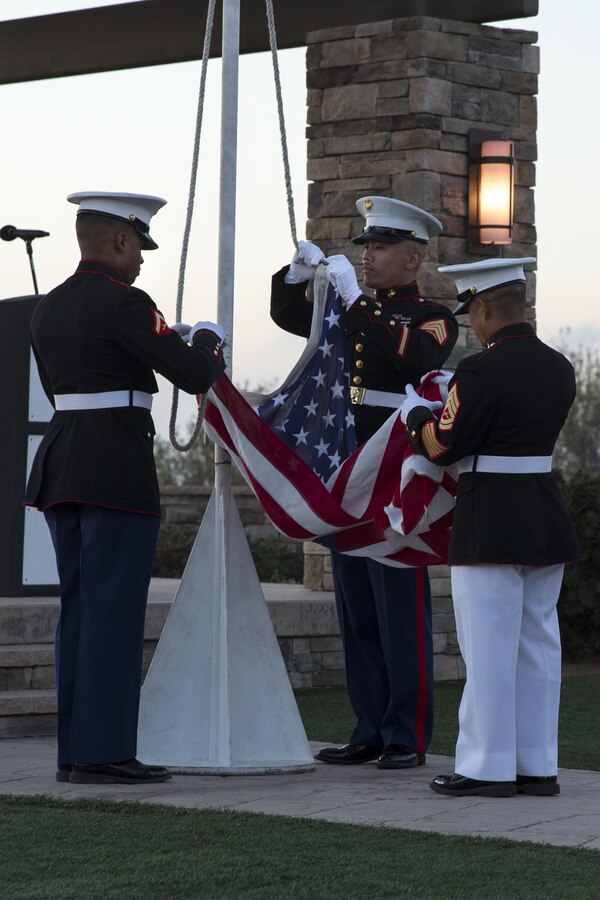 U. S. Marines with Headquarters and Support Battalion, Marine Corps Base Camp Pendleton, retire the colors during the Commanding General’s 75th Annual Evening Colors Ceremony at the Pacific Views Center on Camp Pendleton, Calif., Sept. 29, 2017. Evening colors commemorates the anniversary of the dedication of the base, this year’s ceremony also honors the 75th anniversary of Camp Pendleton. (U. S. Marine Corps photo by Lance Cpl. Betzabeth Y. Galvan)