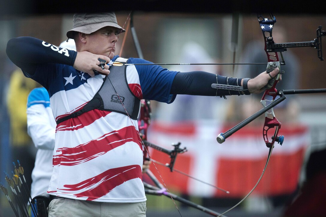 Army Staff Sgt. Michael Lukow competes in archery during the 2017 Invictus Games.