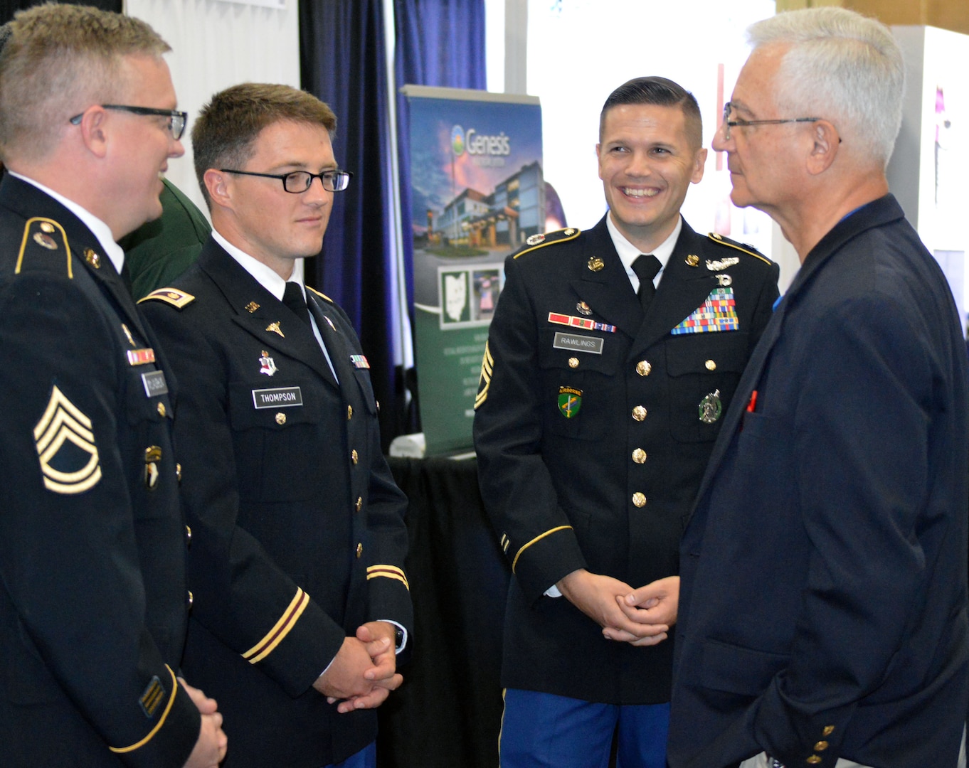 (From left) Army Sgt. 1st Class Chad McLaughlin, lead recruiter for the San Antonio Medical Recruiting Center, Army Maj. Timothy Thompson, an active duty family medicine physician and teaching faculty member at the Martin Army Community Hospital Family Medicine Residency Program in Fort Benning, Ga., and Army Sgt. 1st Class Colin Rawlings, a San Antonio Medical Recruiting Center recruiter, speak with a medical professional at the American Academy of Family Physicians Family Medicine Experience 2017 or FMX 2017, Sept. 14 at the Henry B. Gonzales Convention Center in downtown San Antonio.