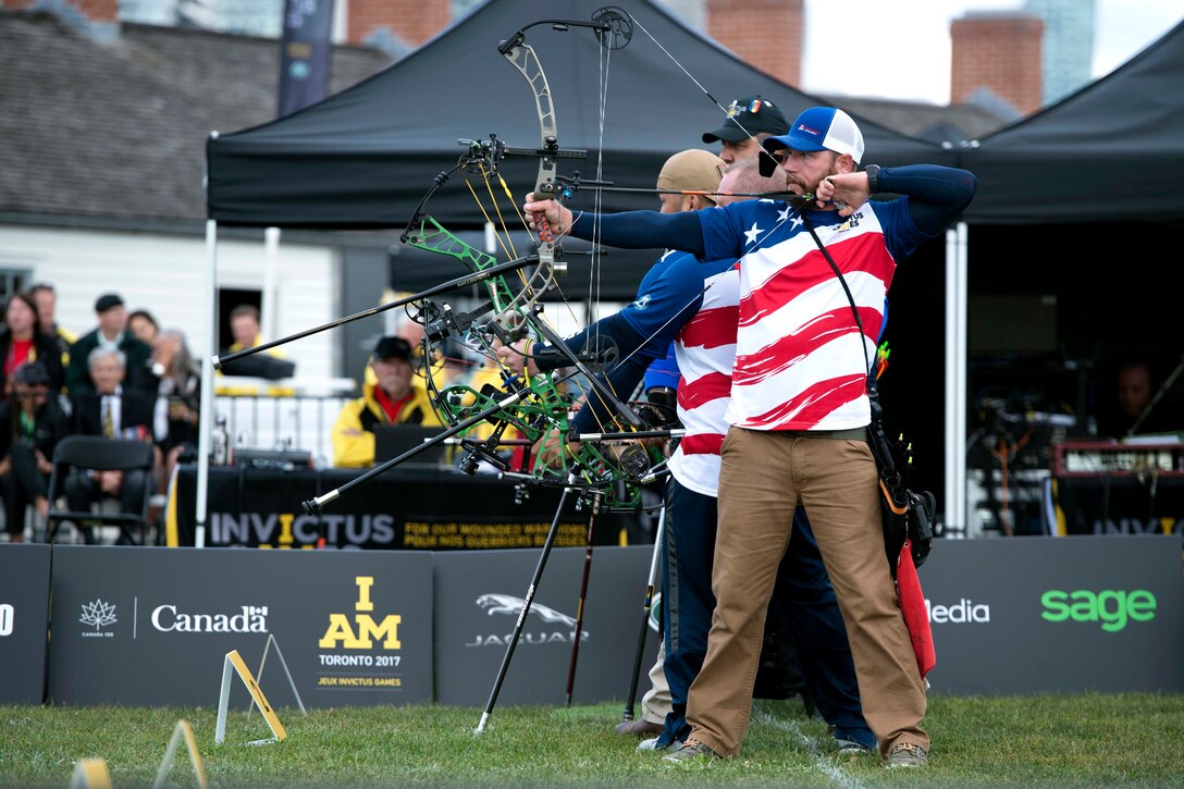 Army Sgt. 1st Class Josh Lindstrom competes in archery during the 2017 Invictus Games.