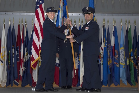 U.S. Air Force Lt. Col. Ricardo Lopez (right), commander of the 50th Air Refueling Squadron (ARS), accepts the guidon from Col. Lisa Nemeth, commander of the 6th Operations Group , at MacDill Air Force Base, Fla., Oct. 2, 2017.