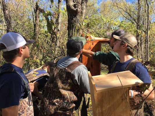 Students from Montgomery Center High School's Agriculture Academy install a wood duck box at Cheatham Lake in Ashland City, Tenn., Sept. 29, 2017 as part of National Public Lands Day activities. (USACE photo by Park Ranger Dean Austin)