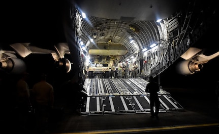 A Humvee is offloaded from a C-17 Globemaster III at Ceiba, Puerto Rico, Sept. 29th, 2017.