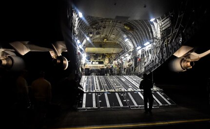 A Humvee is offloaded from a C-17 Globemaster III at Ceiba, Puerto Rico, Sept. 29th, 2017.