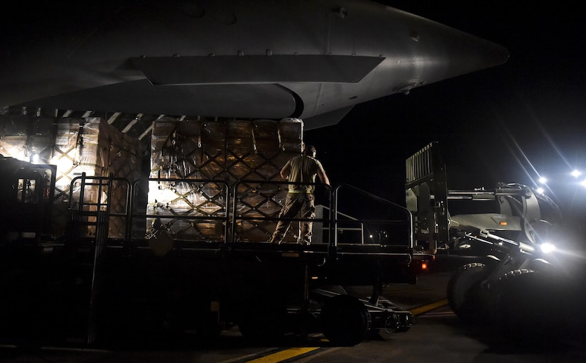 Pallets of food and water are offloaded at San Juan, Puerto Rico, Sept. 30th, 2017.