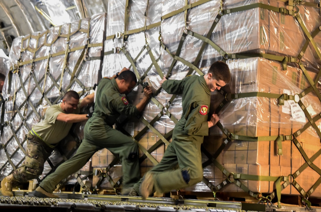 Pallets of food and water are offloaded at San Juan, Puerto Rico, Sept. 30th, 2017.