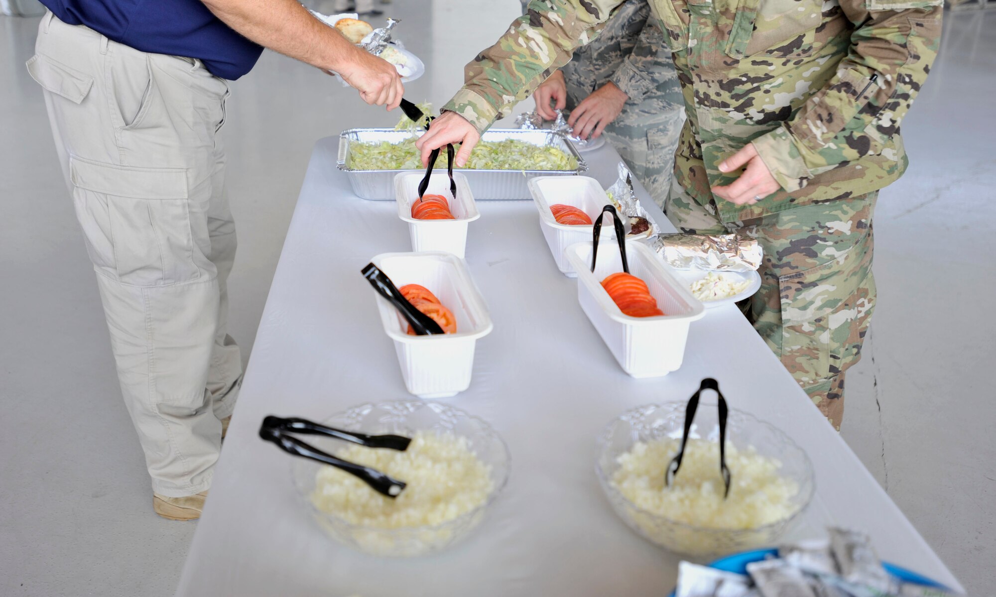 During the picnic, Team Shaw leadership and volunteers from the Sumter community served food to picnic attendees in order to strengthen the bonds of friendship and patriotism.