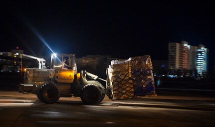 A pallet of food and water is offloaded at San Juan, Puerto Rico, Sept. 30th, 2017.