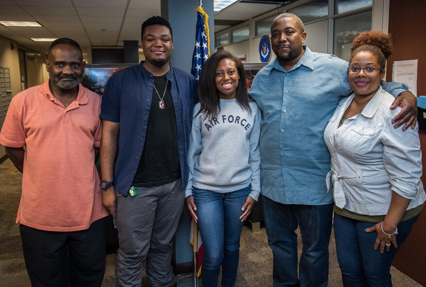 New recruit is joined by family for enlistment.