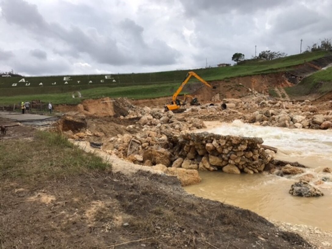 Teams of engineers are working to remove debris from the dam and channel to improve the water’s flow.