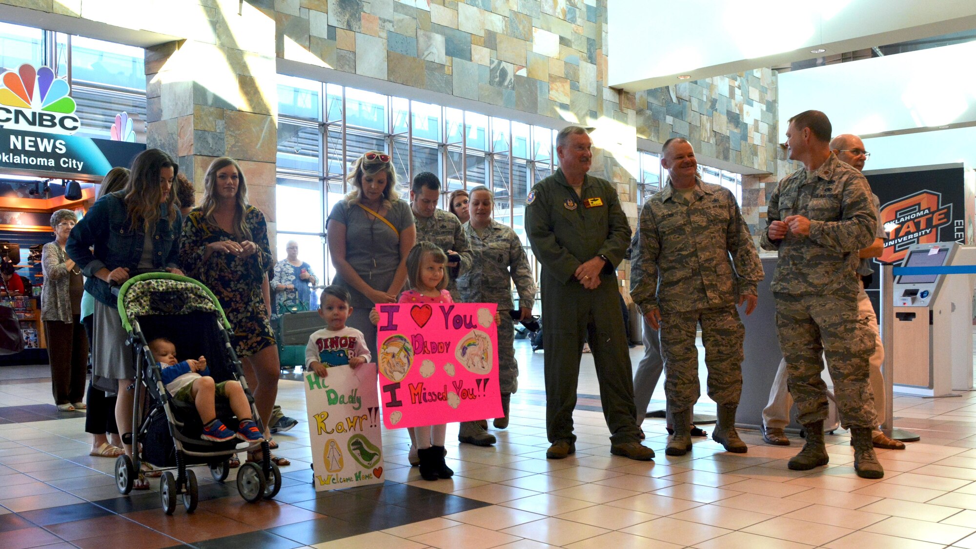 Reserve defenders from the 507th Air Refueling Wing Security Forces Squadron reunite with friends and family Oct. 1, 2017, at Will Rogers World Airport in Oklahoma City, following a six-month deployment to Afghanistan in support of Operation Freedom’s Sentinel. The Reserve Citizen Airmen served at Kandahar Air Base, Afghanistan, where they assisted the Afghan Air Force in their fight against insurgents. The team of Reserve defenders was part of a Fly Away Security Team, which is made up of Security Forces Airmen who travel with aircraft to provide extra security around unsecured foreign airfields. (U.S. Air Force photo/Tech. Sgt. Samantha Mathison)