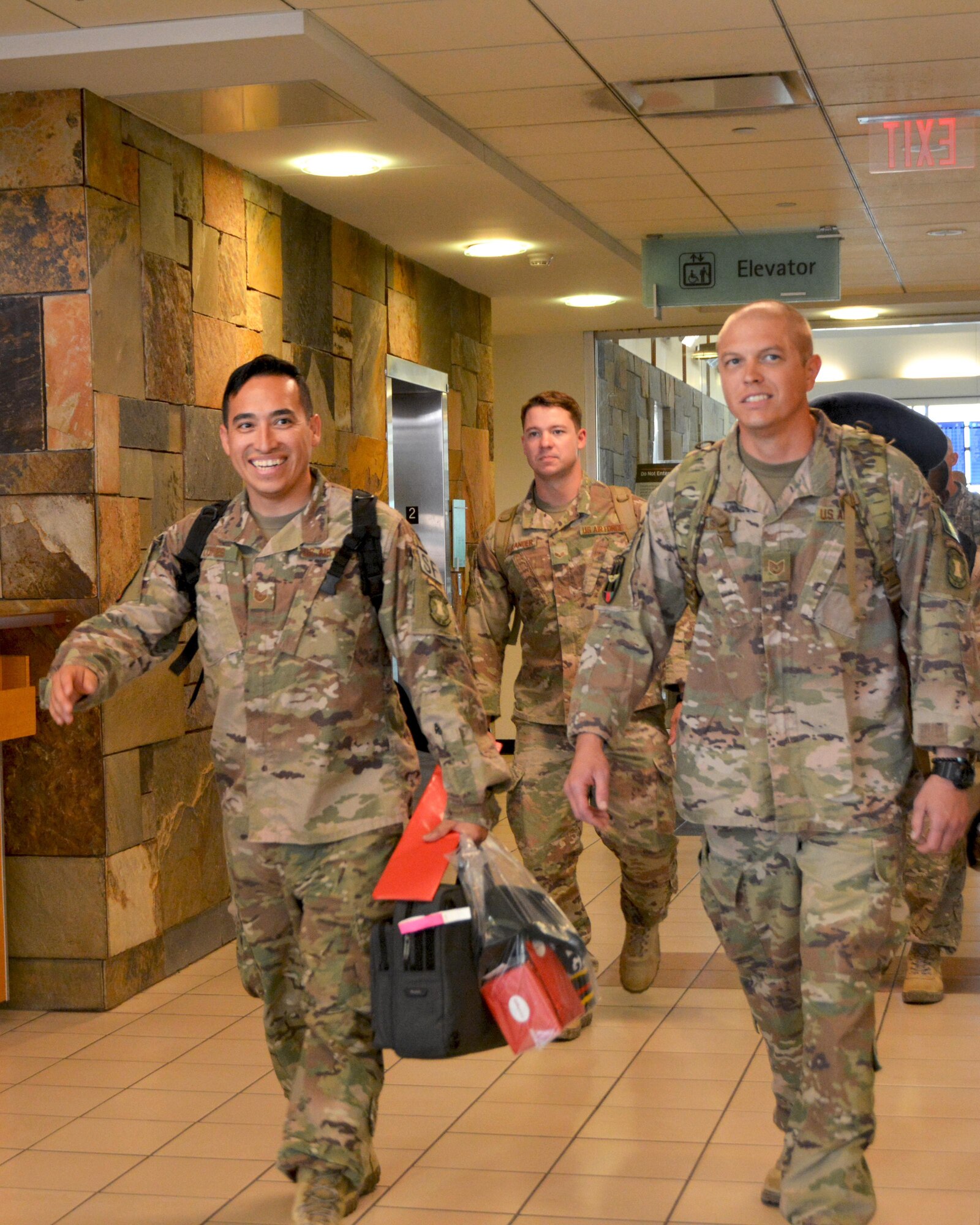 Reserve defenders from the 507th Air Refueling Wing Security Forces Squadron reunite with friends and family Oct. 1, 2017, at Will Rogers World Airport in Oklahoma City, following a six-month deployment to Afghanistan in support of Operation Freedom’s Sentinel. The Reserve Citizen Airmen served at Kandahar Air Base, Afghanistan, where they assisted the Afghan Air Force in their fight against insurgents. The team of Reserve defenders was part of a Fly Away Security Team, which is made up of Security Forces Airmen who travel with aircraft to provide extra security around unsecured foreign airfields. (U.S. Air Force photo/Tech. Sgt. Samantha Mathison)