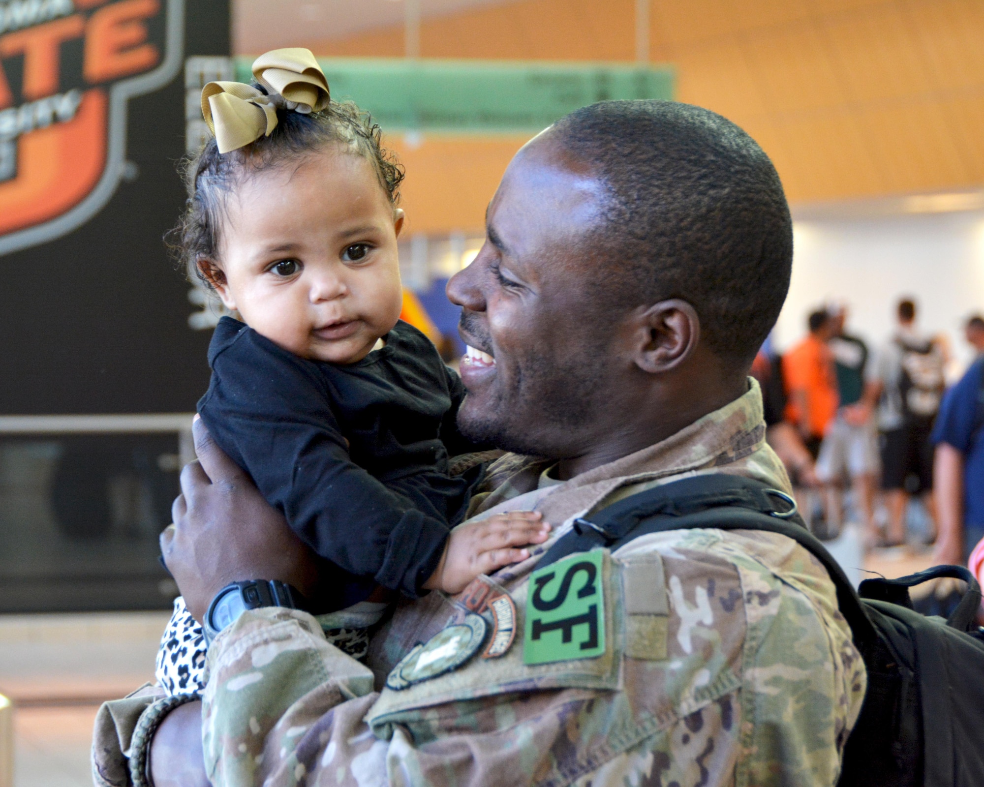 Reserve defenders from the 507th Air Refueling Wing Security Forces Squadron reunite with friends and family Oct. 1, 2017, at Will Rogers World Airport in Oklahoma City, following a six-month deployment to Afghanistan in support of Operation Freedom’s Sentinel. The Reserve Citizen Airmen served at Kandahar Air Base, Afghanistan, where they assisted the Afghan Air Force in their fight against insurgents. The team of Reserve defenders was part of a Fly Away Security Team, which is made up of Security Forces Airmen who travel with aircraft to provide extra security around unsecured foreign airfields. (U.S. Air Force photo/Tech. Sgt. Samantha Mathison)