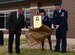 Forest R. McDonald, son of Ola “Millie” Rexroat, and Col. John Edwards, commander of the 28th Bomb Wing, unveil the plaque honoring Rexroat during a building dedication at Ellsworth Air Force Base, Oct. 2, 2017. While serving as a WASP, Rexroat towed targets behind a T-6 Texan for air-to-air gunnery and ground-to-air anti-aircraft practice for male pilots. She also transported personnel and cargo. After the WASPS disbanded, Rexroat served another ten years in the Air Force Reserves as an air traffic controller. (U.S. Air Force Photo by Airman 1st Class Donald C. Knechtel)