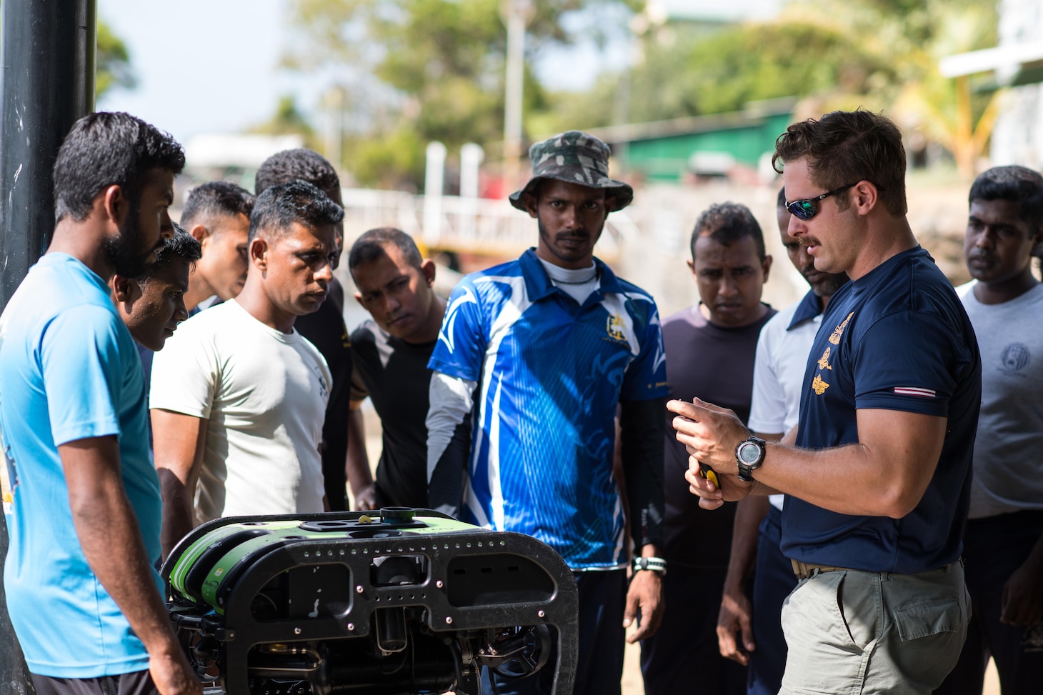 U.S. Navy Explosive Ordnance Disposal Technician 2nd Class Josh Wilborn, assigned to Explosive Ordnance Disposal Mobile Unit (EODMU) 5, demonstrates the use of a Seabotix remote operated vehicle (ROV) to Sri Lankan Navy personnel during Cooperation Afloat Readiness and Training (CARAT) Sri Lanka 2017 in Trincomalee, Sri Lanka, Oct. 2, 2017. CARAT is a series of annual maritime exercises between the U.S. Navy, U.S. Marine Corps and the armed forces of partner nations to include Bangladesh, Brunei, Indonesia, Malaysia, Sri Lanka, Singapore, Thailand and Timor-Leste.