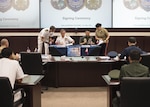 CAMP H.M. SMITH, Hawaii (Sept. 28, 2018)—Adm. Harry Harris, Commander of U.S. Pacific Command (PACOM), and Gen. Eduardo Año, Chief of Staff for the Armed Forces of the Philippines, review paperwork for the Mutual Defense Board (MDB) and Security Engagement Board (SEB). During Año’s two-day visit to PACOM, he and Harris discussed changes to the MDB and SEB. The MDB provides direct liaison and consultation on military matters of mutual concern to develop and improve both countries’ common defense. The SEB provides the framework and mechanism for continuing liaison and consultation on non-traditional threats to security such as terrorism, transnational crimes, maritime security, and natural and man-made disasters. (U.S. Navy photo by Mass Communication Specialist 2nd Class James Mullen/Released)
