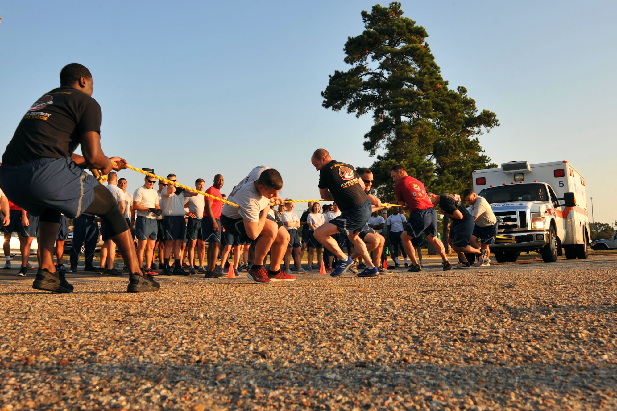 U.S. Airmen assigned to the 20th Fighter Wing move an ambulance during a Warrior Day at Shaw Air Force Base, S.C., Sept. 29, 2017.