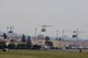 Three UH-1N Iroquois helicopters assigned to the 459th Airlift Squadron take off for a formation flight
