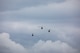 Three UH-1N Iroquois helicopters assigned to the 459th Airlift Squadron take off for a formation flight