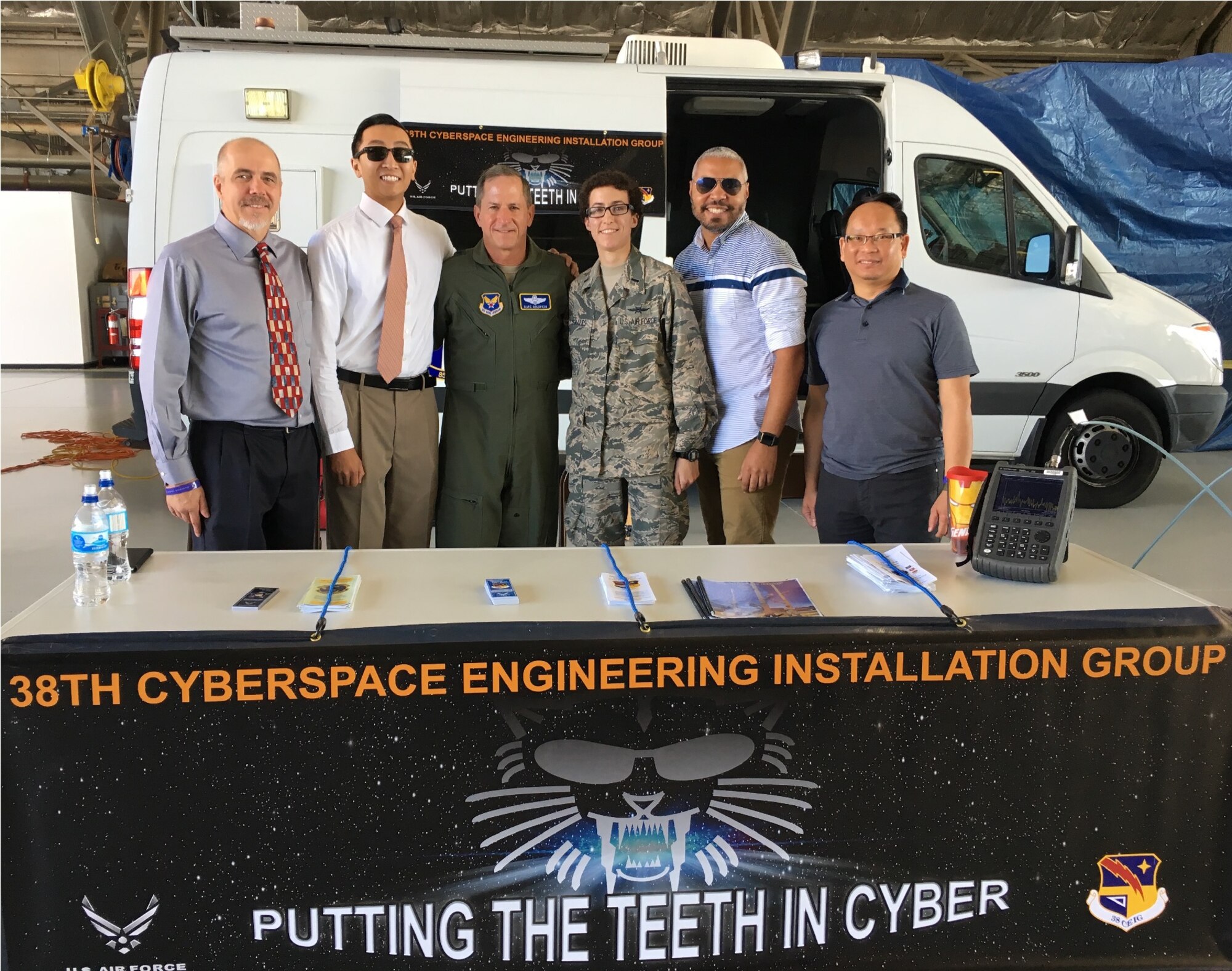 Chief of Staff of the Air Force, General David Goldfein, poses with personnel from the 38th Cyberspace Engineering and Implementation Group during the Andrews AFB Airshow, Md, 15 Sep 2017.