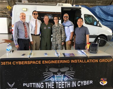 Chief of Staff of the Air Force, General David Goldfein, poses with personnel from the 38th Cyberspace Engineering and Implementation Group during the Andrews AFB Airshow, Md, 15 Sep 2017.